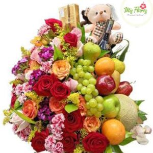 Arreglo Frutal con rosas , baileys y peluche